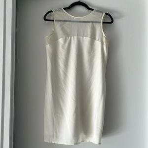 White mini sheath dresss with mesh top and low back